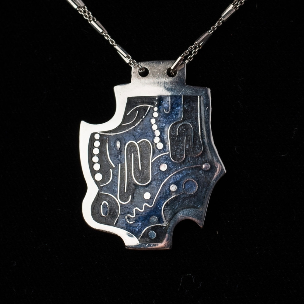 Handmade enamel pendants